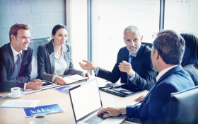 Executive CIOs and CTOs discuss cybersecurity at a meeting